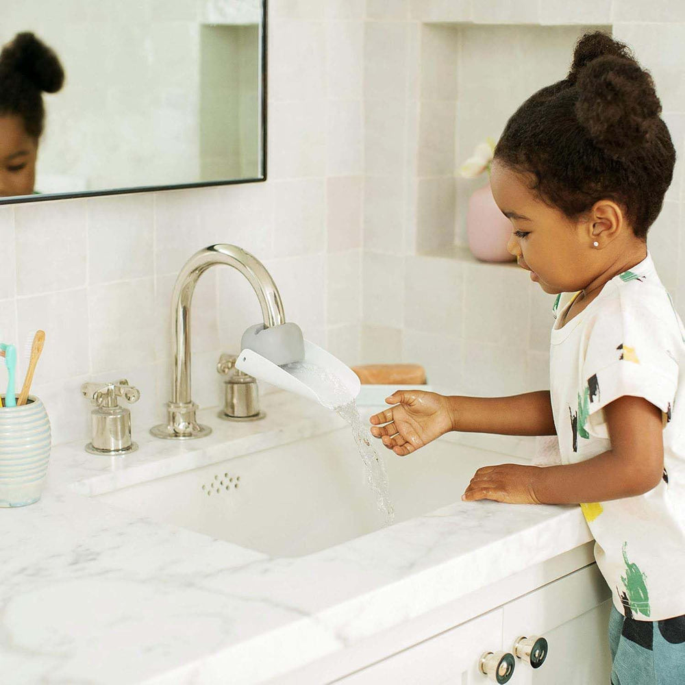 faucet-extender large-angle install on bathroom faucet enables kids to reach water easily.