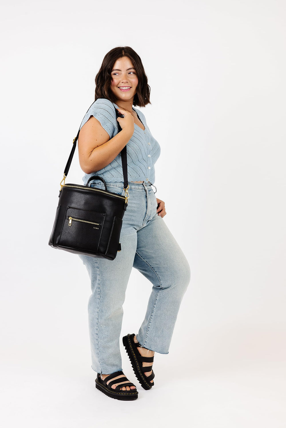 FAWN DESIGN Mini Diaper Bag top zipper access speeds quick diaper changes.