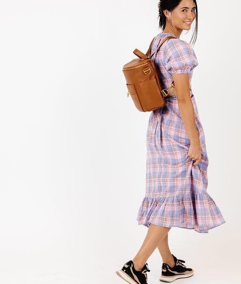 FAWN DESIGN mini gold hardware adds high-end detail and secure zippers.