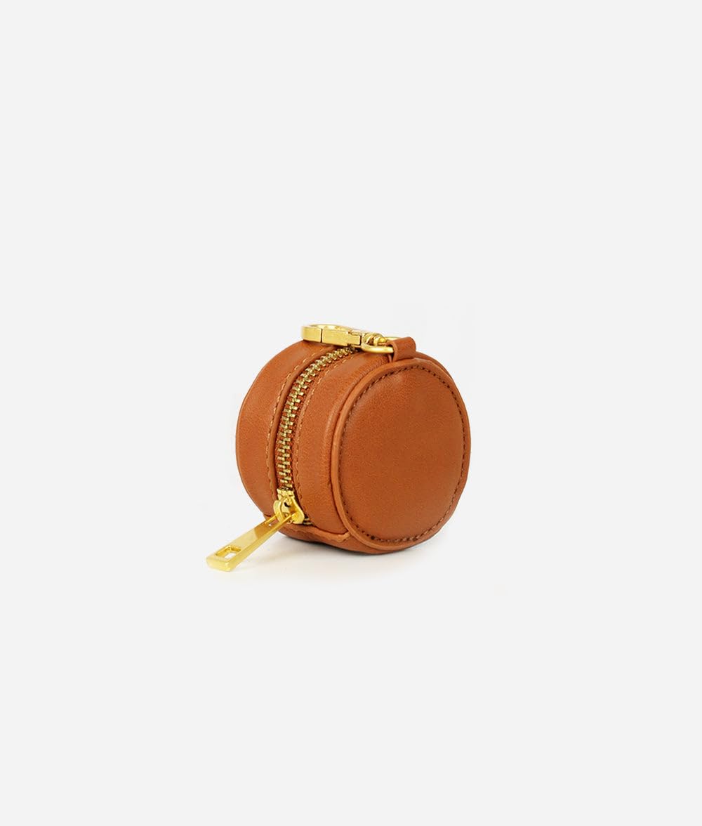 FAWN DESIGN Paci Case clip attaches to diaper bag for easy reach.