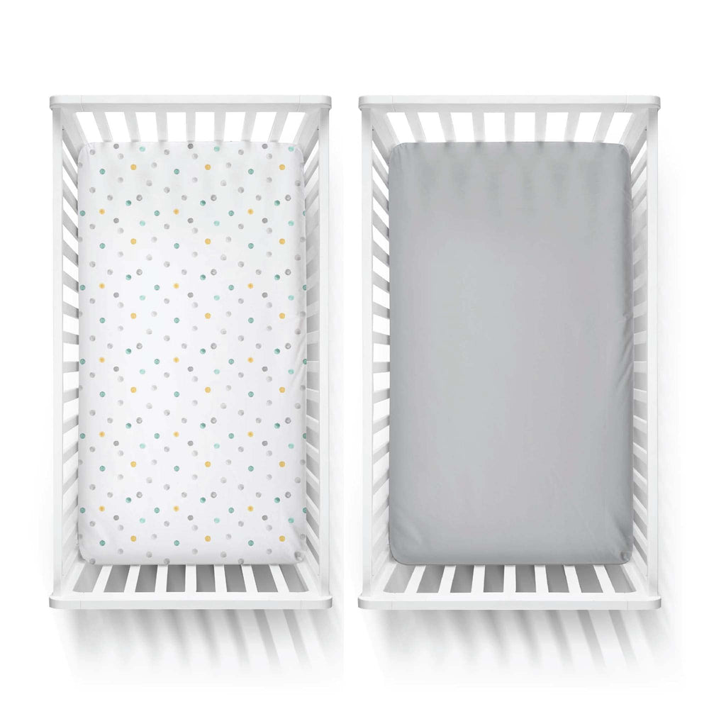Featherhead 2-pack fitted crib sheets showing elastic edge detail, ensuring tight corners.