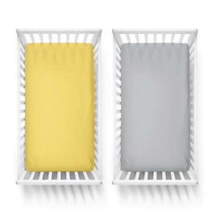Featherhead fitted crib sheets grey yellow prints offer versatile nursery styling options.