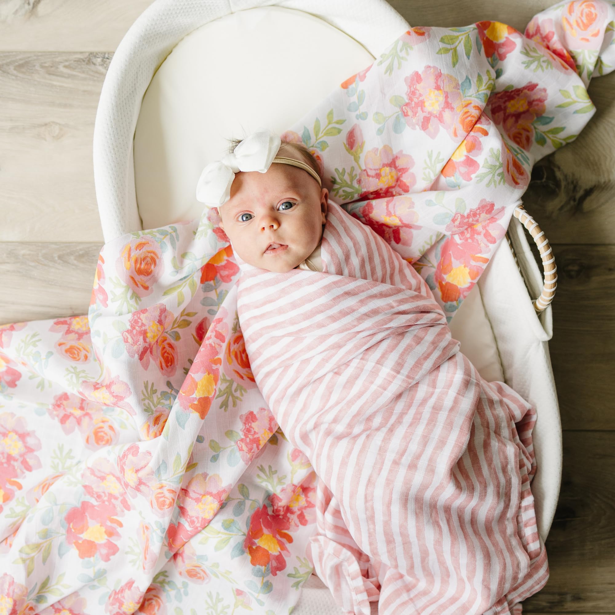 Featherhead Garden Floral swaddle pack folded demonstrates easy storage and portability for caregivers.