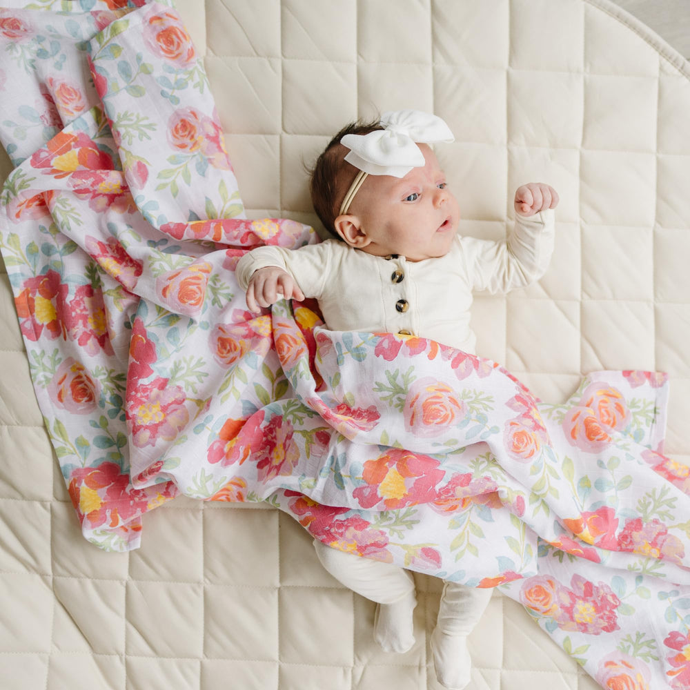 Featherhead muslin fabric softening process shows prewashed texture and gentle touch.