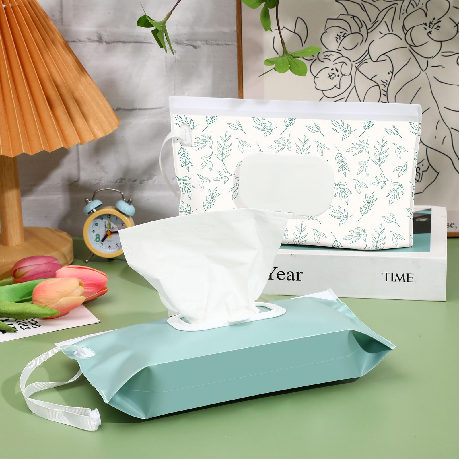 FEBSNOW wipes dispenser attached to a stroller with secure clip for quick access.