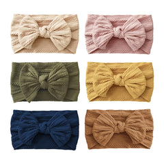 Fecawd 6pcs baby headbands color set, soft nylon for gentle all-day wear.