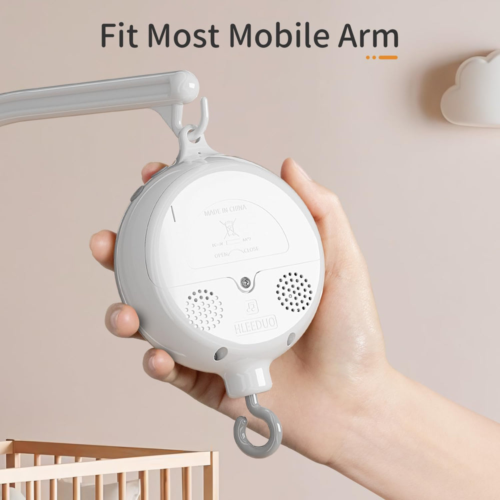 FEISIKE crib mobile motor volume-dial enables precise sound levels for nap or play