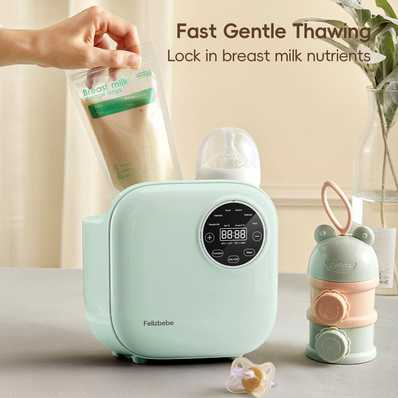 Felizbebe bottle warmer one-hand operation allows feeding while holding baby.