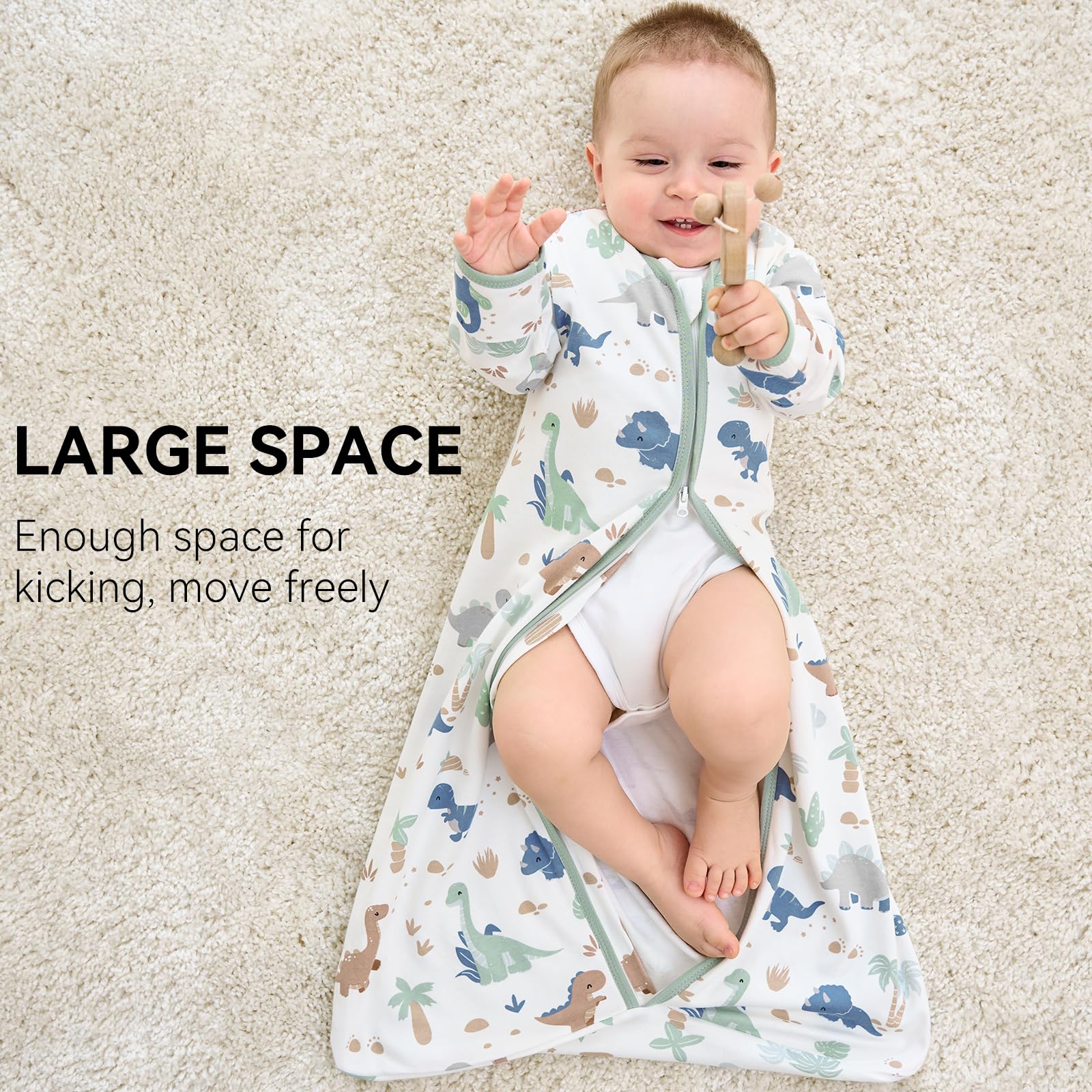FIEMOL green dinosaur detail shows soft breathable cotton texture