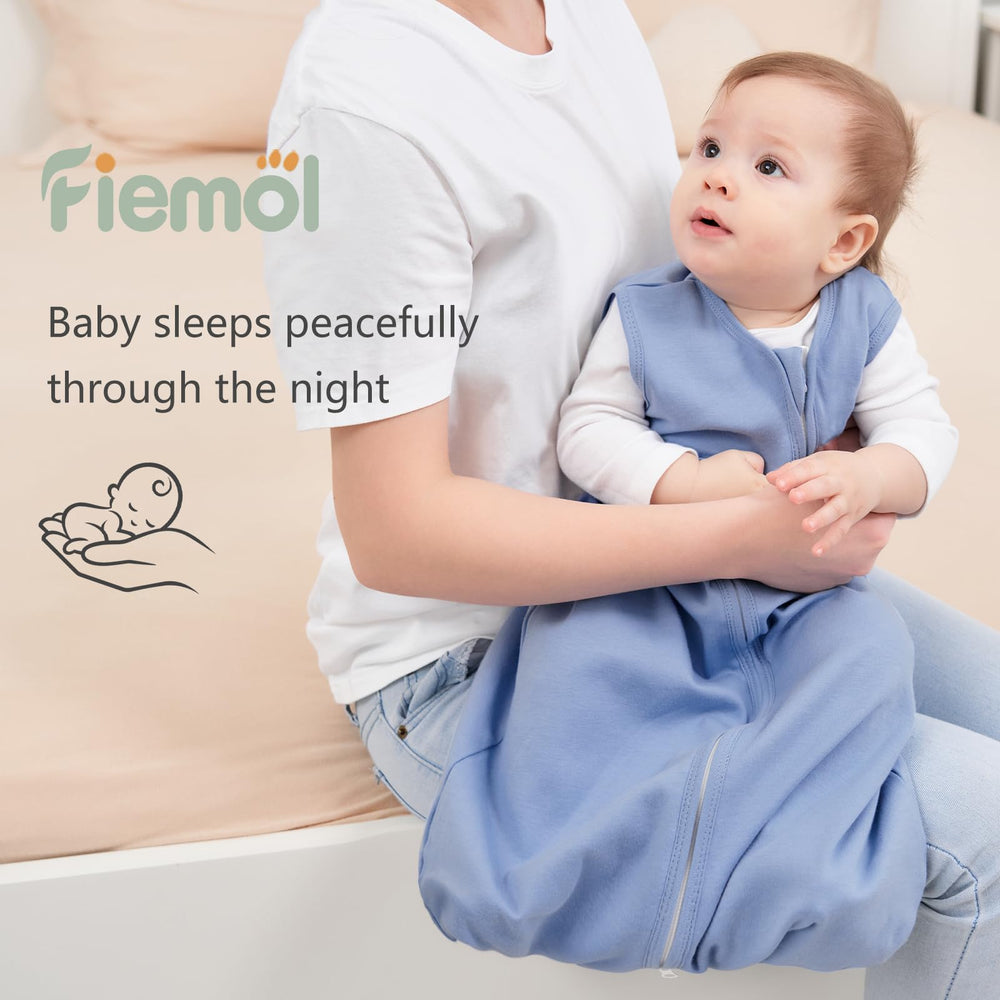 FIEMOL sleep sack cyan size range covers newborn to 24 months.