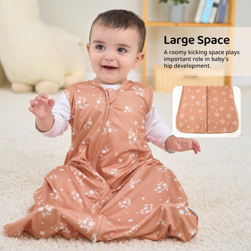 FIEMOL orange-flower sleep sack showcases cheerful design for everyday naps.