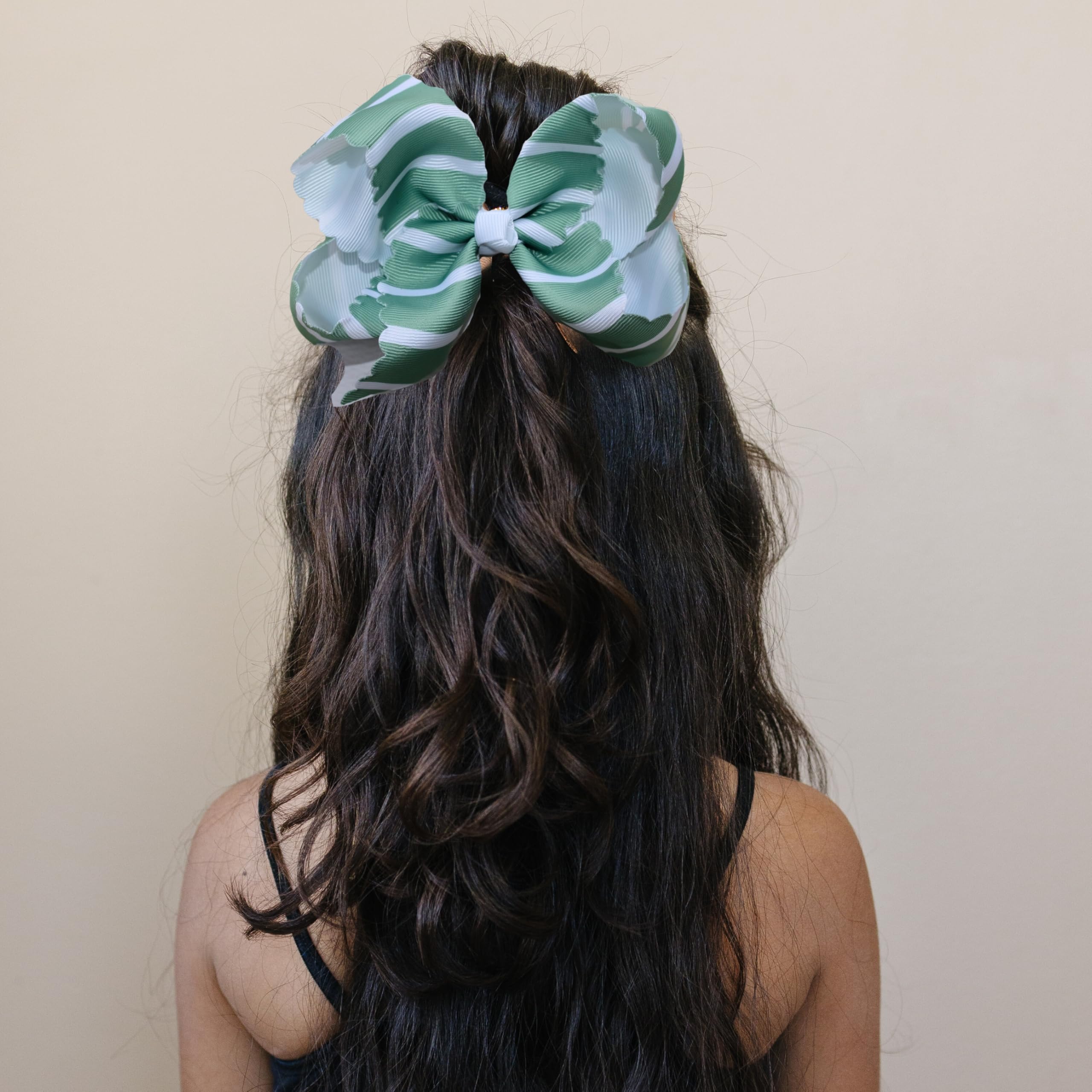 Fifi & Ry baby peach bow highlighting delicate look and gentle hold for fine hair
