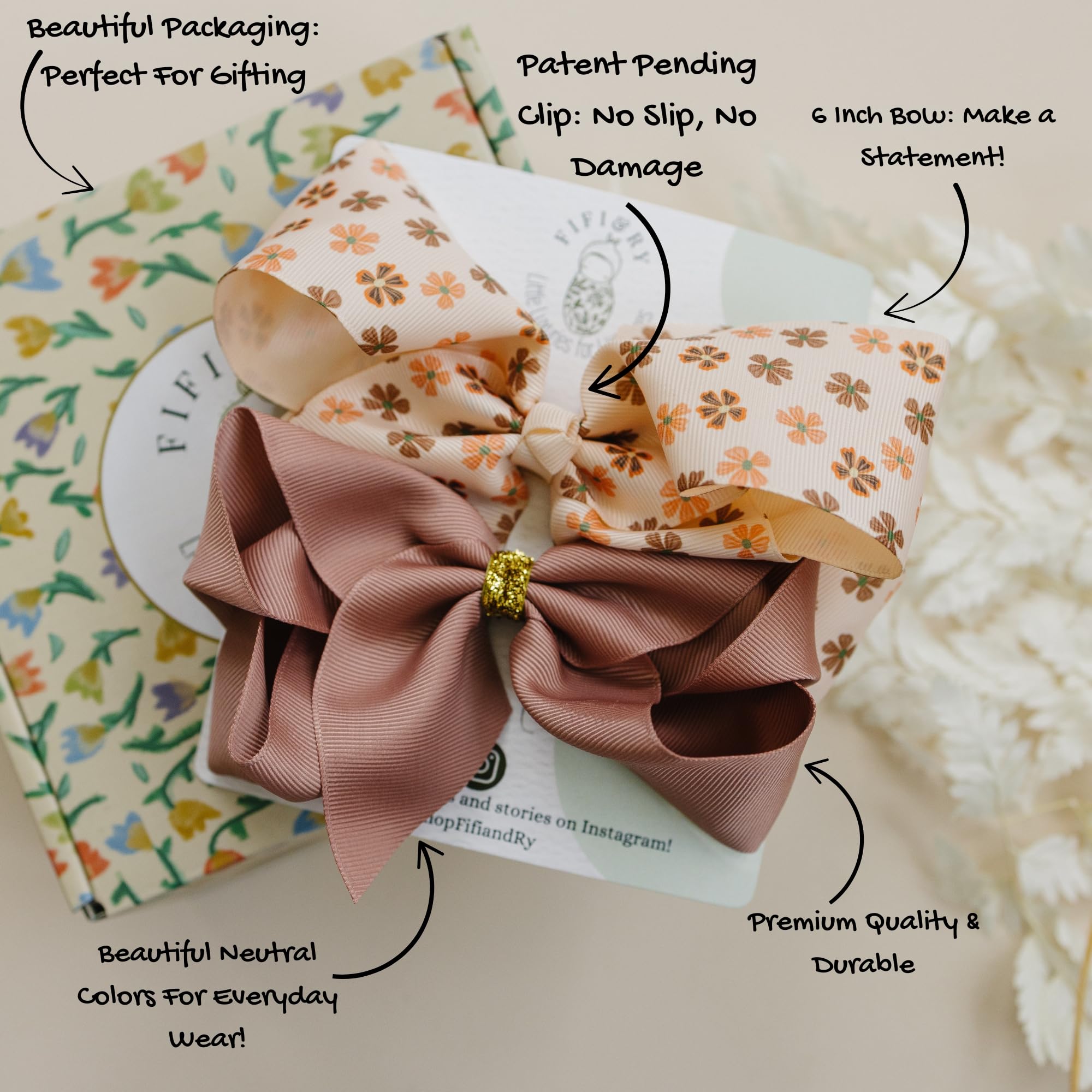 Fifi & Ry handmade artwork bow reflecting hand-drawn charm and humanitarian support