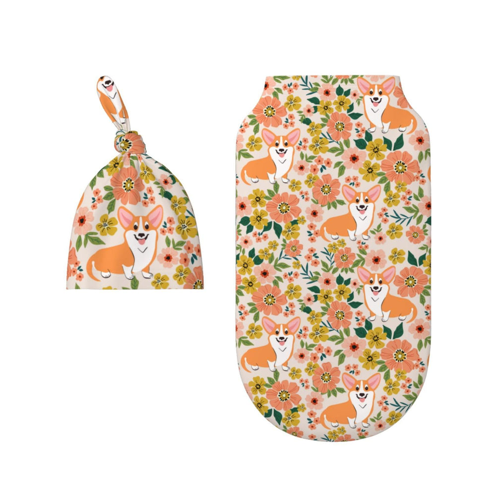 Figtihw dog-pattern swaddle blanket wrapped around a sleeping infant for warmth