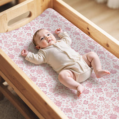 FIOBEE changing pad cover showing waterproof inner layer keeps pads dry