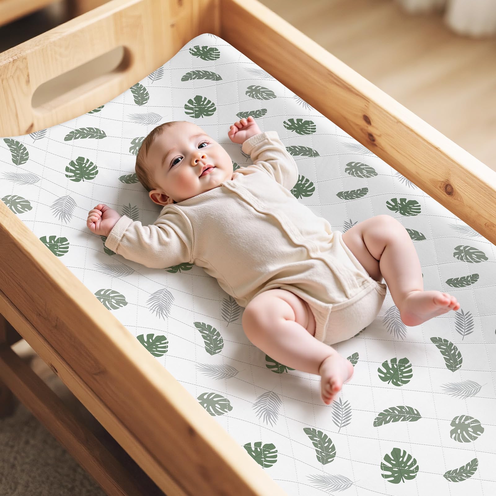 FIOBEE changing pad cover waterproof layer closeup demonstrates dry, mess-free changes