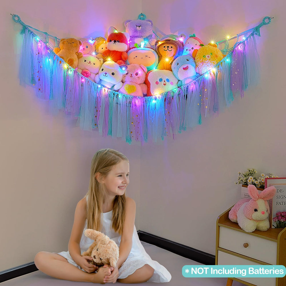 FIOBEE wall-mount toy hammock keeps clutter off the floor in nurseries and playrooms
