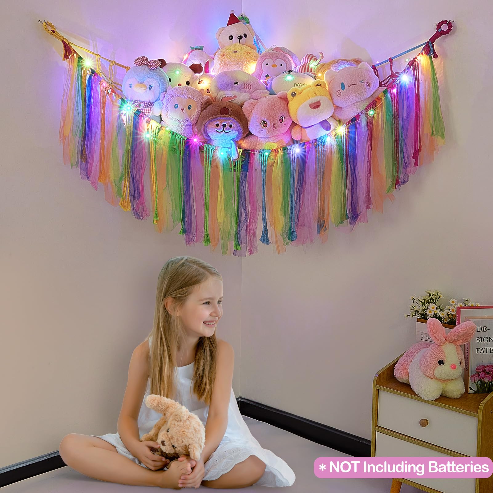 Fiobee toy hammock wall mounting demonstrates clutter-free nursery