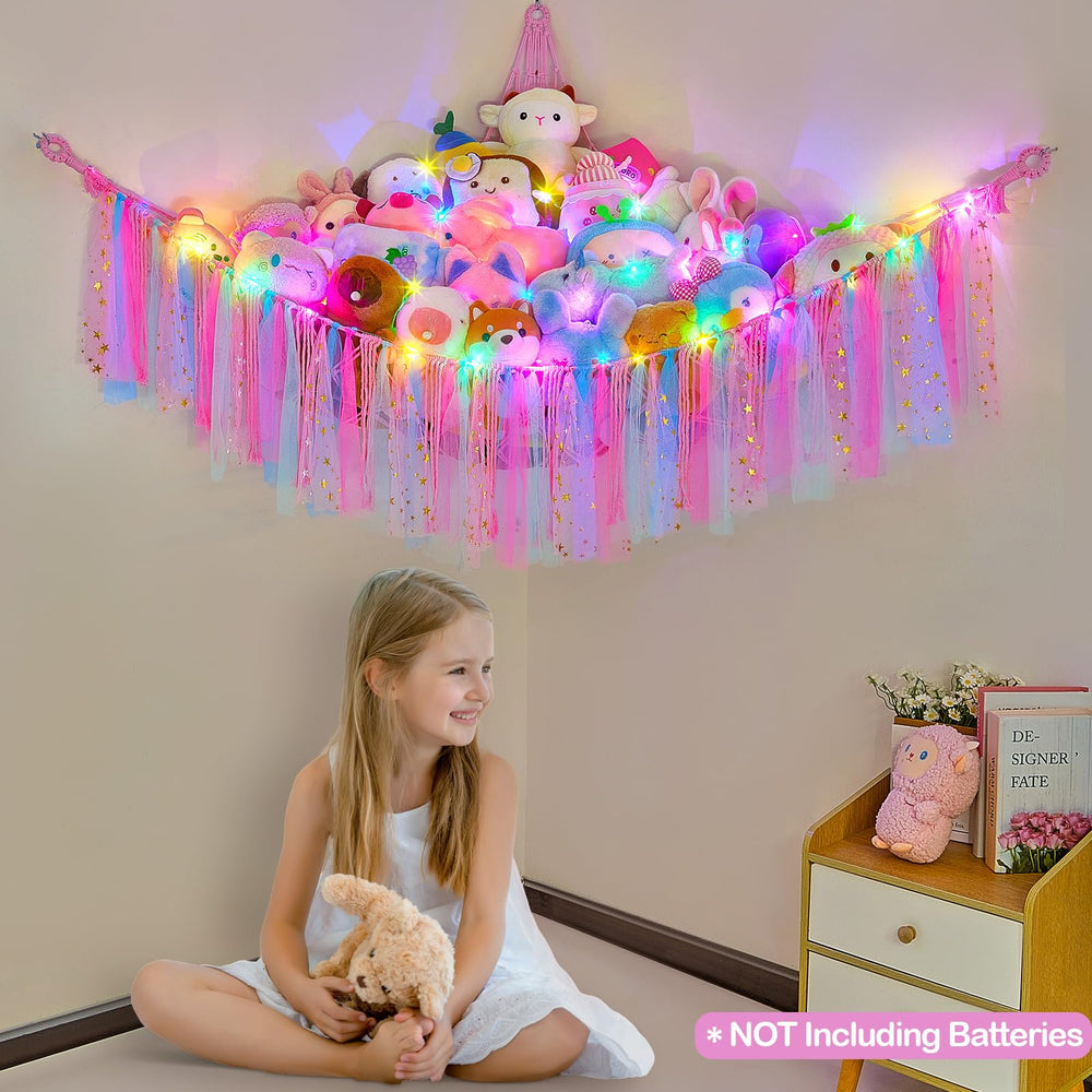 Fiobee wall-hanging toy storage saves floor space in a kids' bedroom