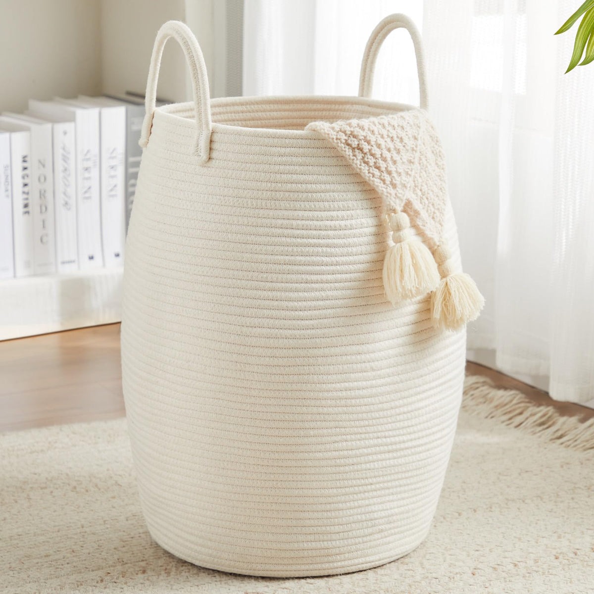 Fiona's magic 105L laundry hamper in beige woven exterior provides spacious storage.