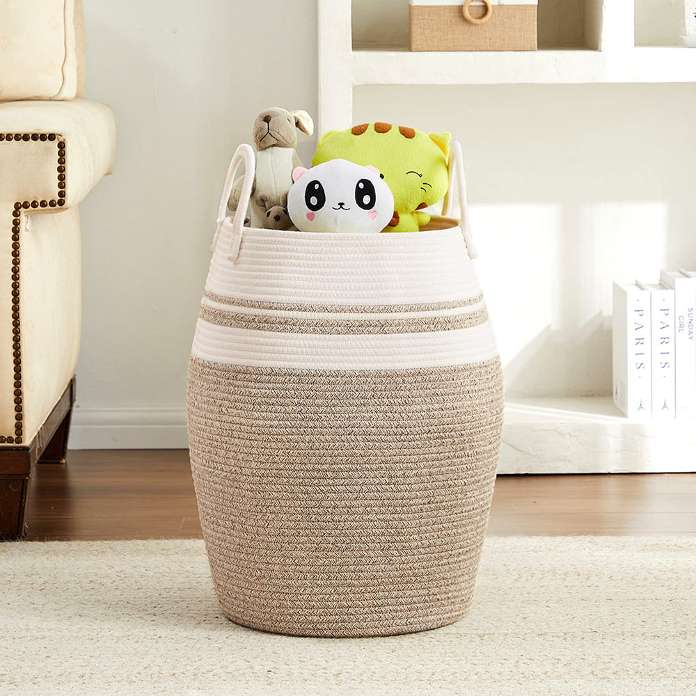 Fiona's magic 65L hamper in a bedroom complements decor while organizing blankets and toys.