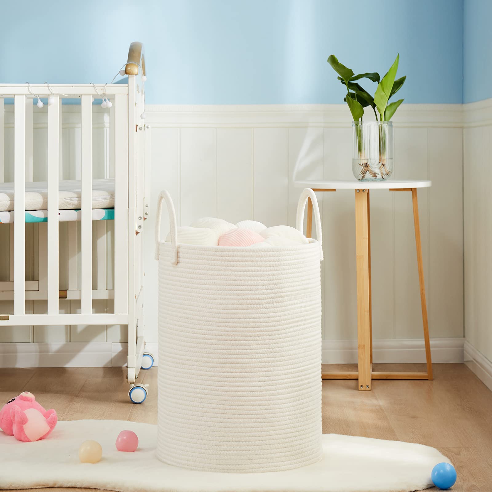 Fiona's magic baby-nursery-laundry-hamper keeps nursery laundry contained and tidy.