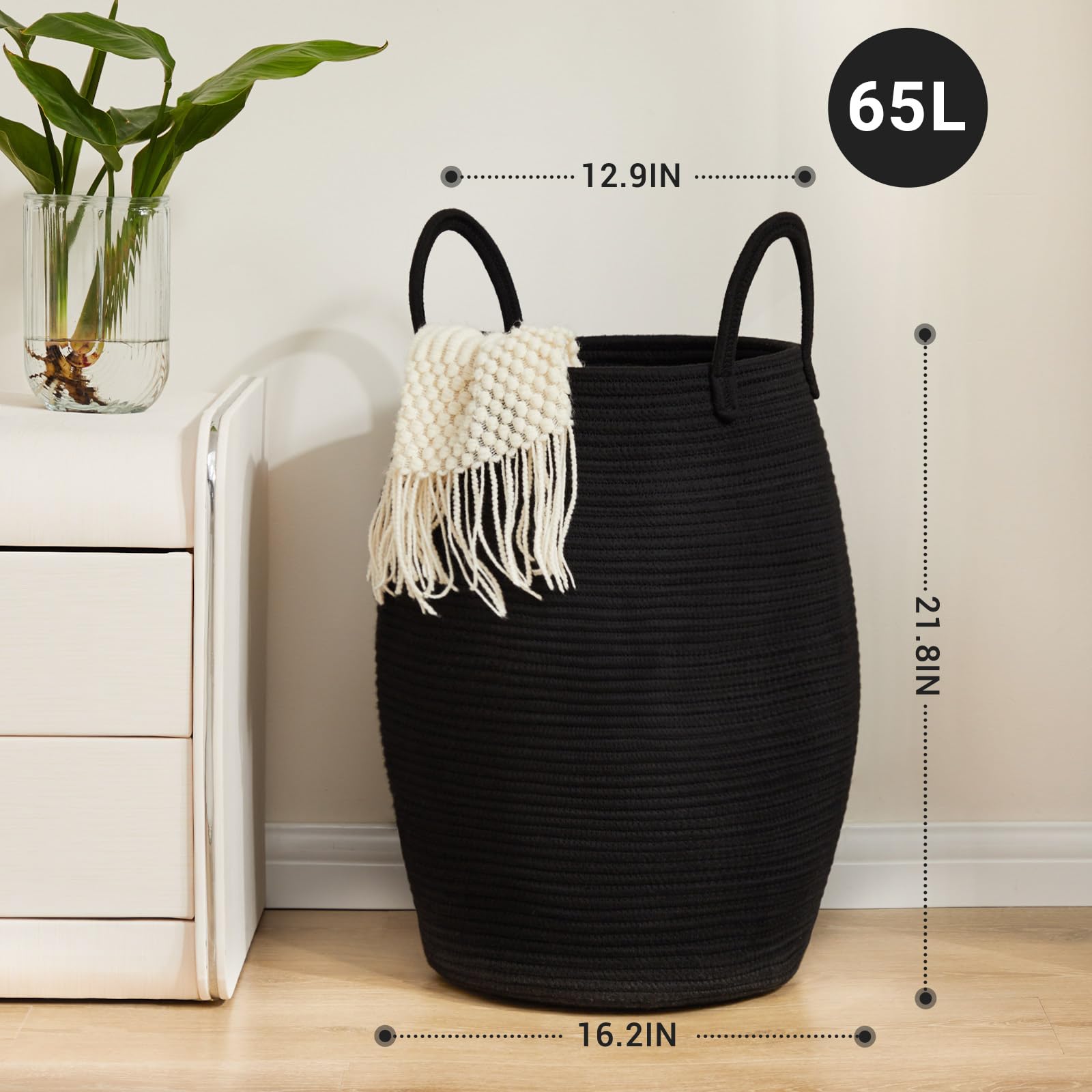 Fiona's magic collapsible laundry hamper with black rope design ready for storage.