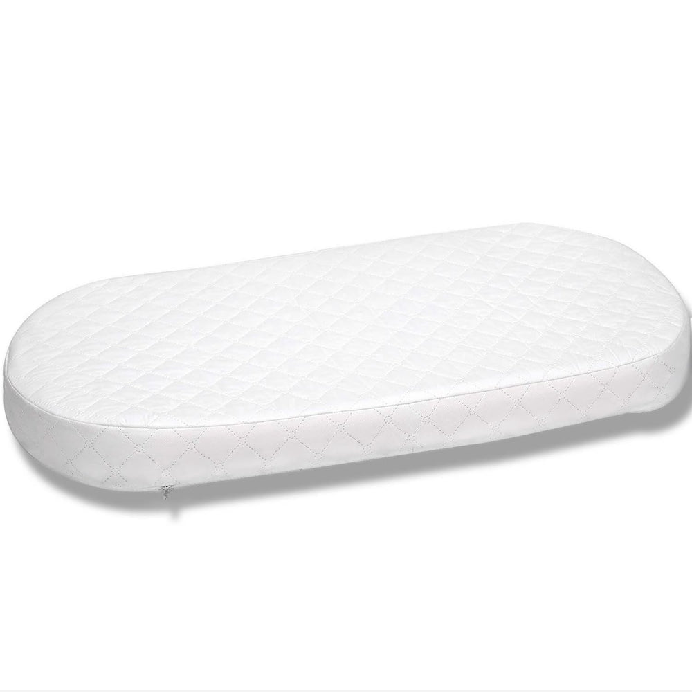 First Essentials bassinet mattress pad oval 16x31 side profile highlights durable edge support