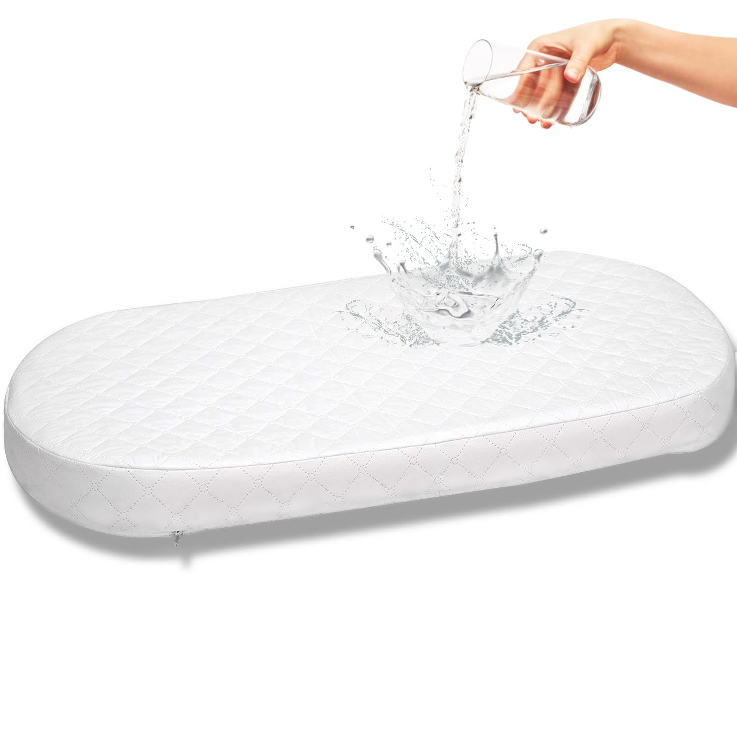 First Essentials bassinet mattress pad oval top view shows a safe sleeping surface