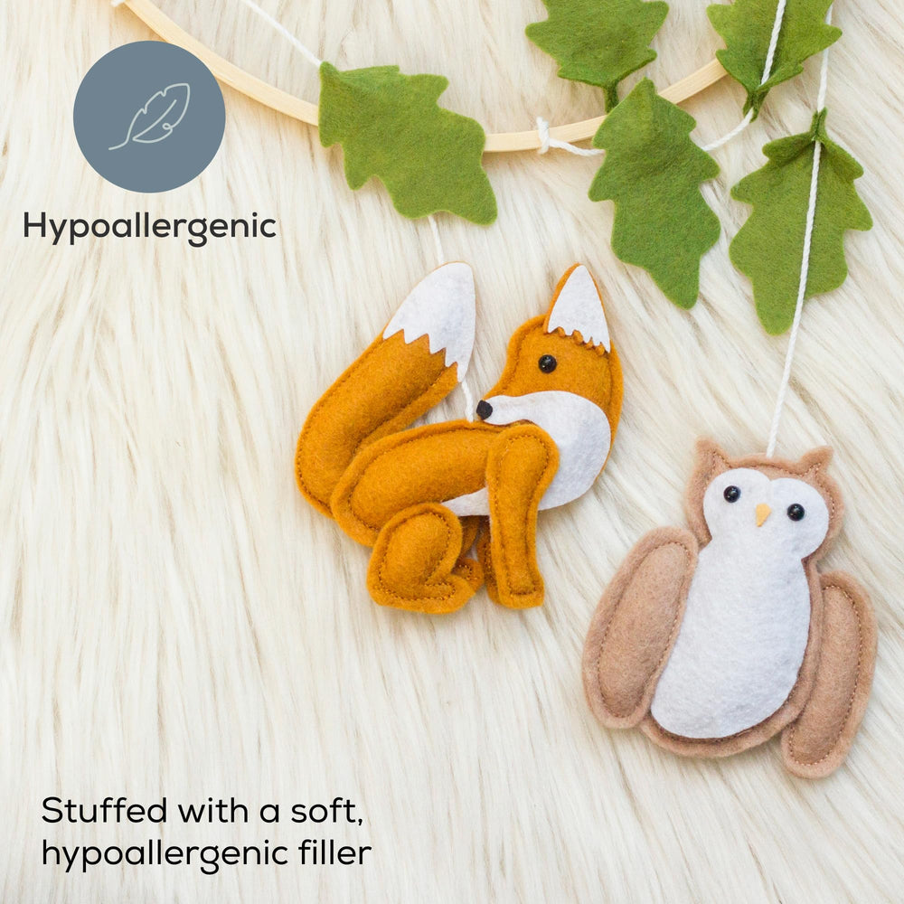 First Landings forest mobile raccoon — eco-friendly felt with soft stitching.