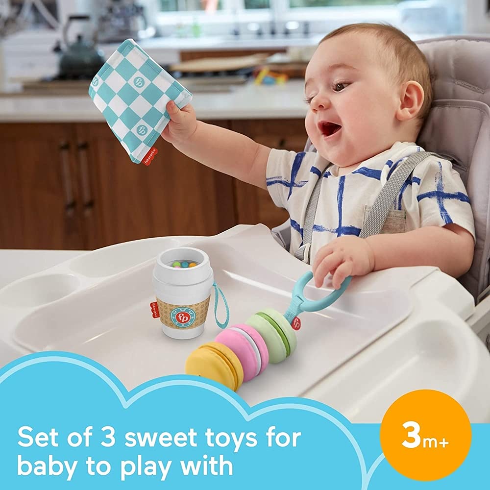 Fisher-Price Baby Bakery Treats crinkle napkin sparks imagined crumb-catching fun.
