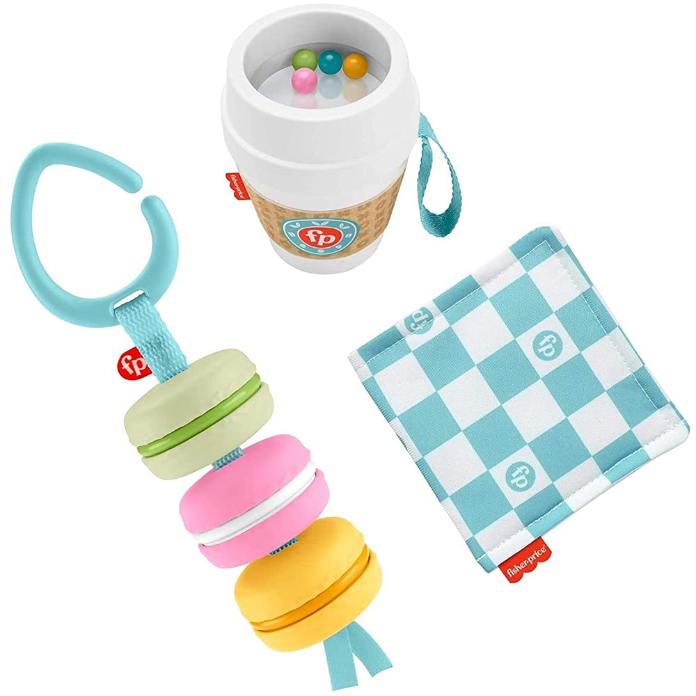 Fisher-Price Baby Bakery Treats macaron toy with ribbons for tactile on-the-go play.