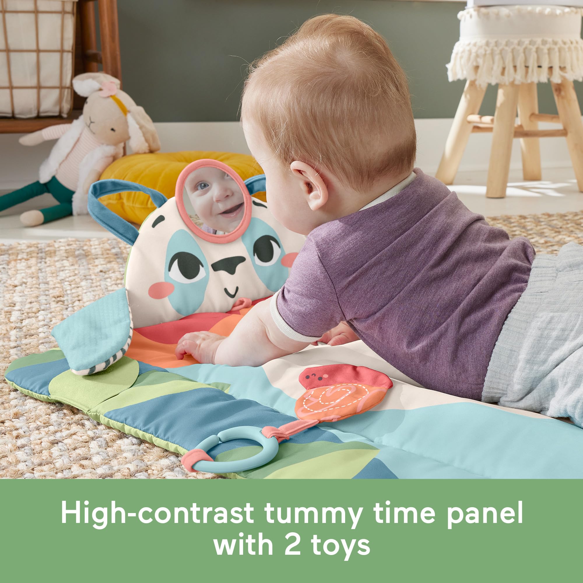 Fisher-Price Baby Planet Friends eco fabric close-up showing recycled material.
