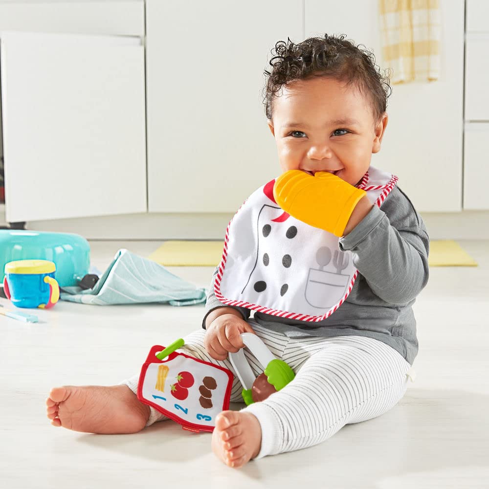 Fisher-Price Cutest Chef baby mealtime play set sparks fine motor exploration.