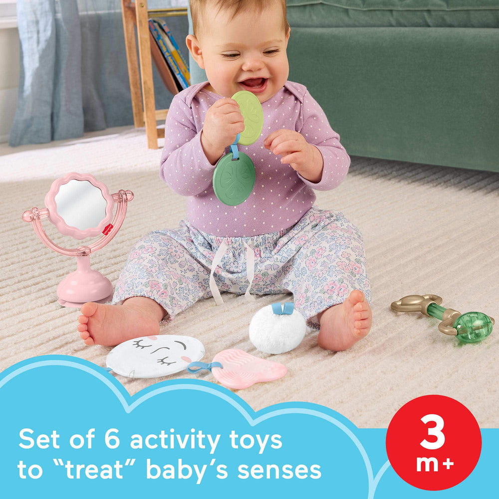 Fisher-Price Mini Me Moments squeaker puff engages hearing and grasp for infants