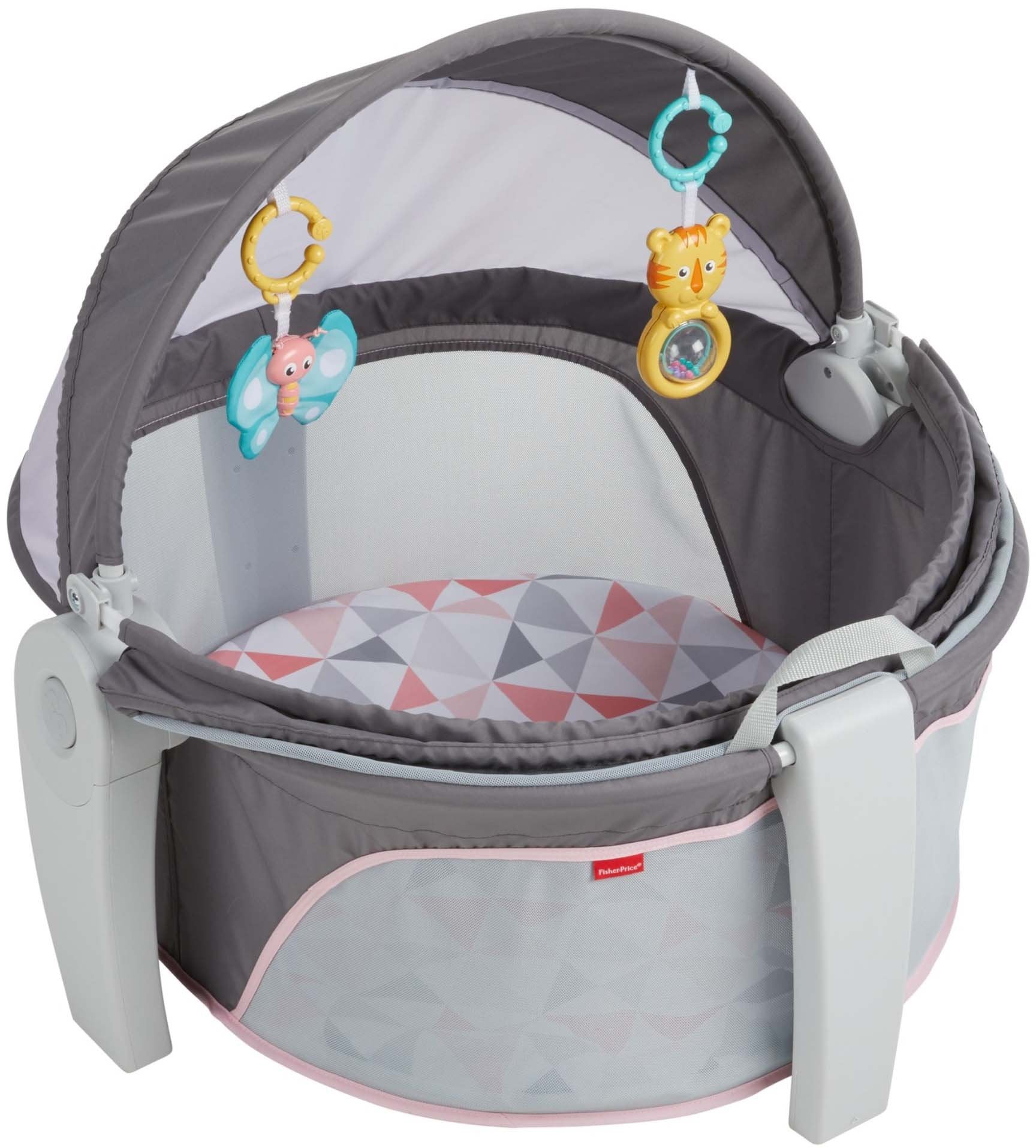 Fisher-Price portable bassinet nap pad offers comfy surface for resting.