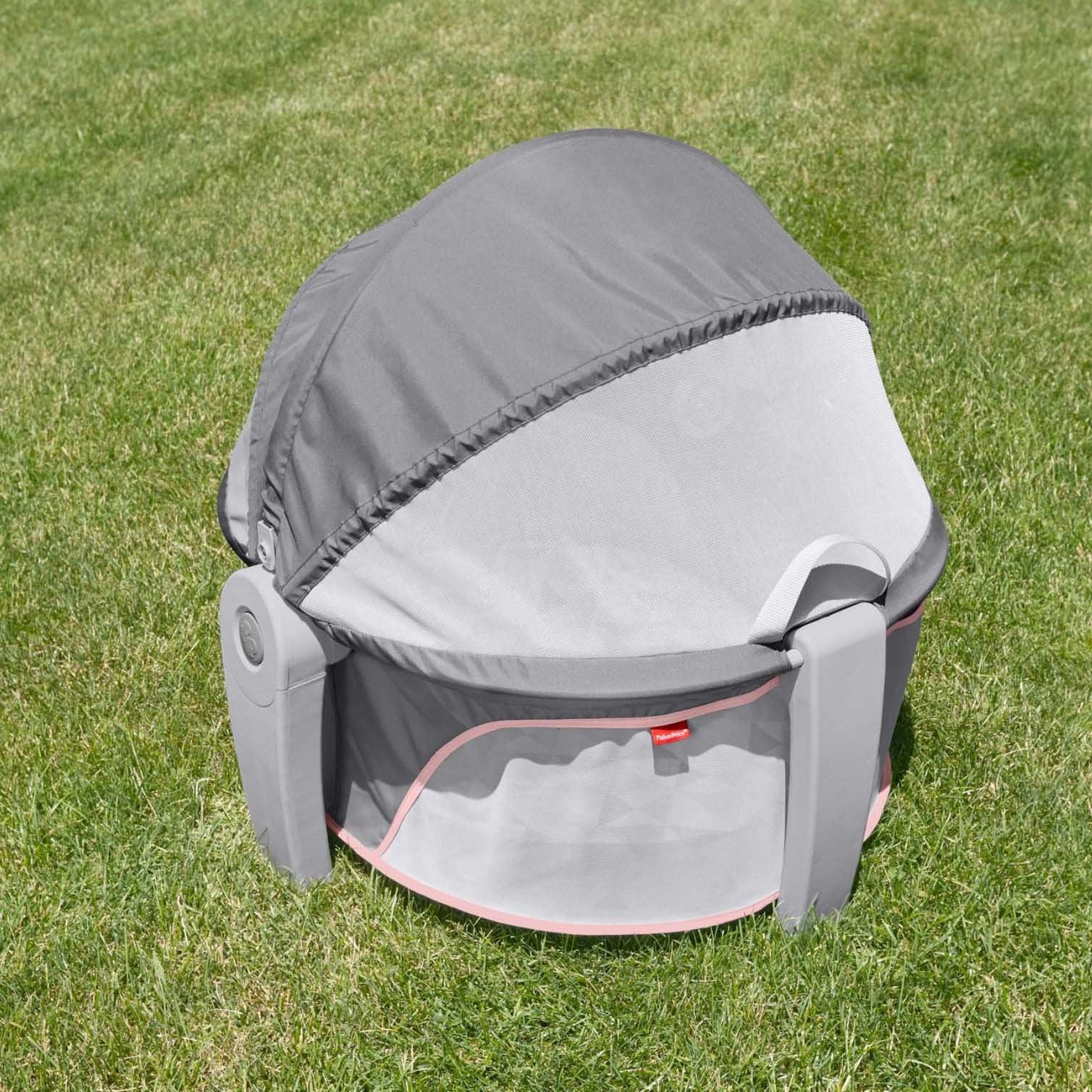 Fisher-Price portable bassinet overhead toys promote eye tracking and focus.