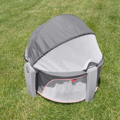 Fisher-Price portable bassinet overhead toys promote eye tracking and focus.