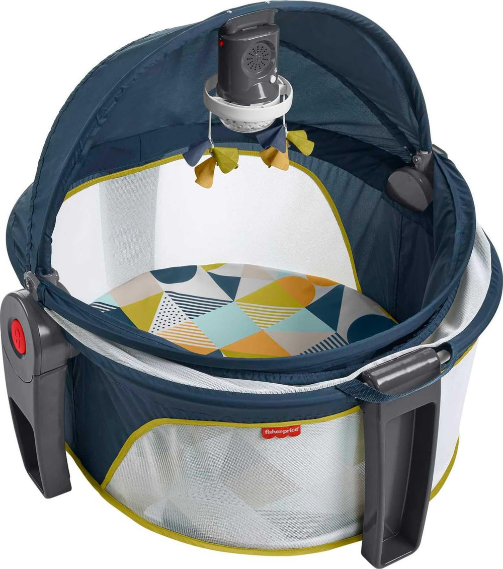 Fisher-Price projection dome indoors and outdoors offering soothing lights and music.