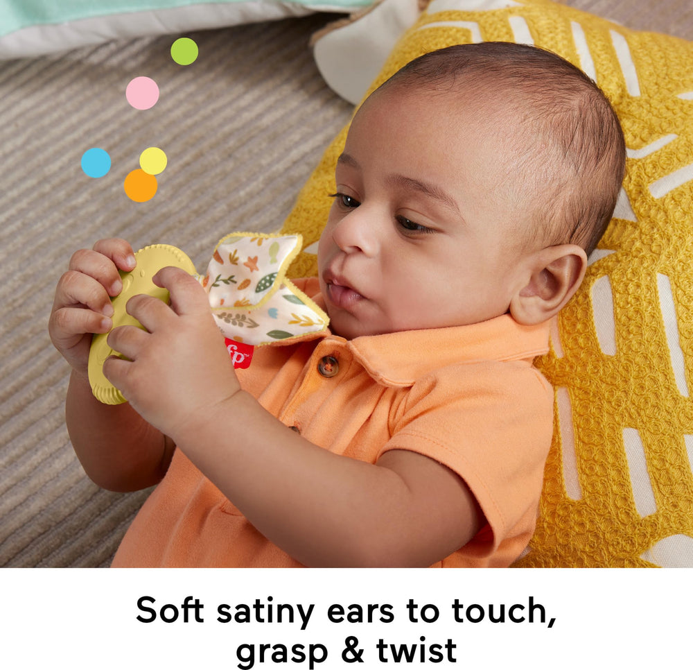 Fisher-Price Snuggle Bunny Teether used during tummy time for sensory exploration