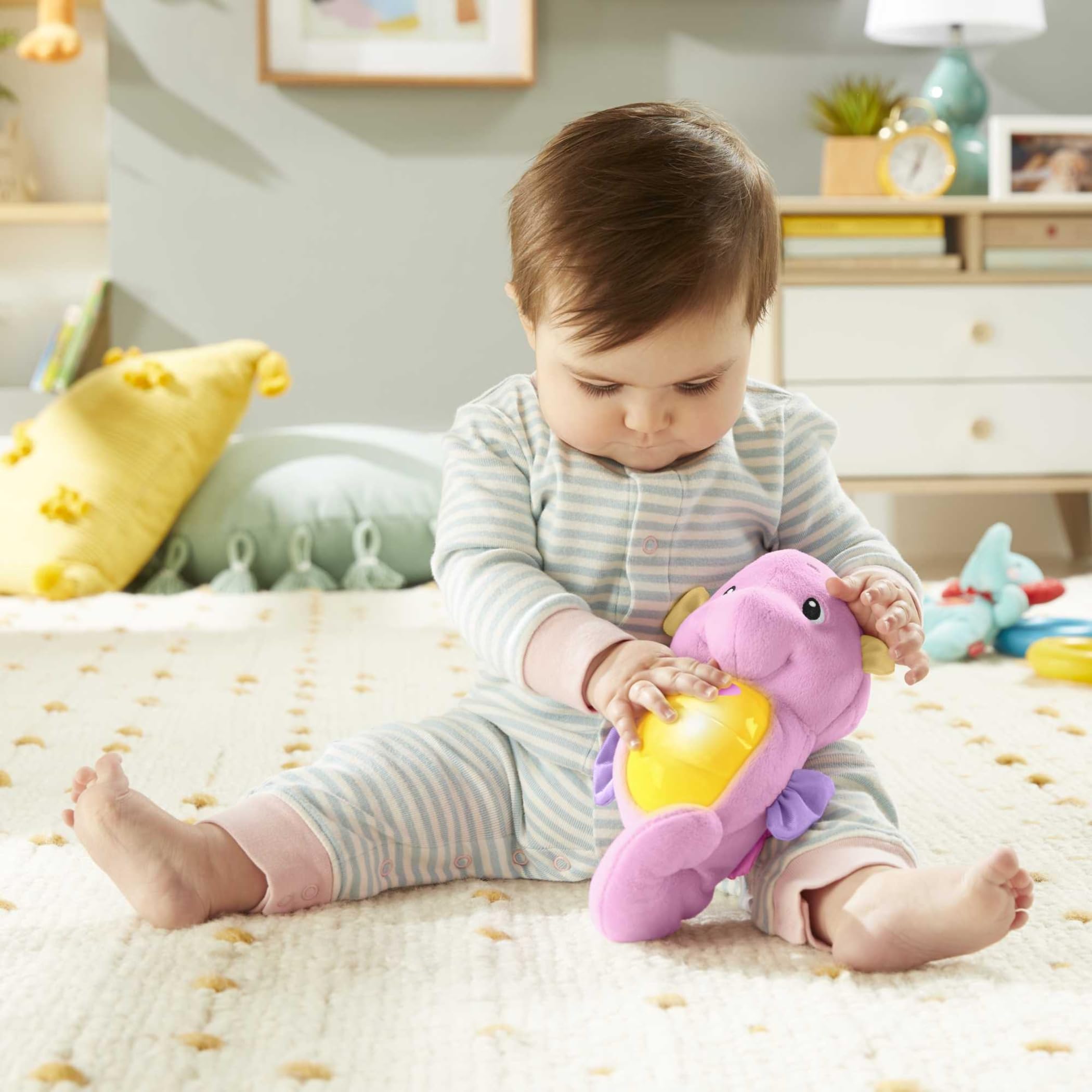Fisher-Price Soothe & Glow Seahorse belly-press activates lights and music for soothing routines.