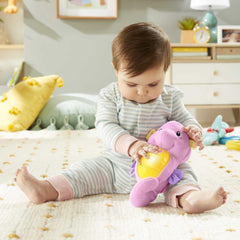 Fisher-Price Soothe & Glow Seahorse belly-press activates lights and music for soothing routines.