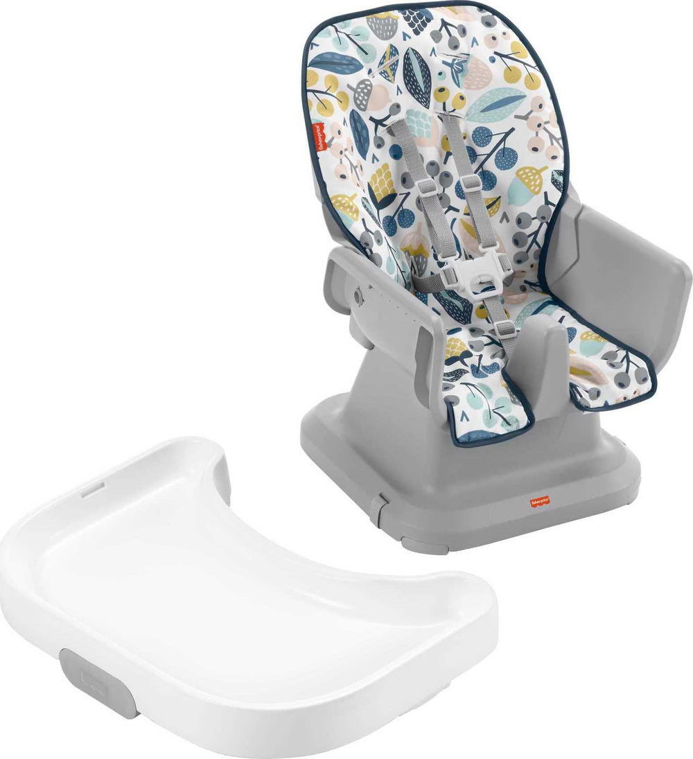 Fisher-Price SpaceSaver high chair navy foliage dishwasher-safe-tray—simple cleanup after meals.