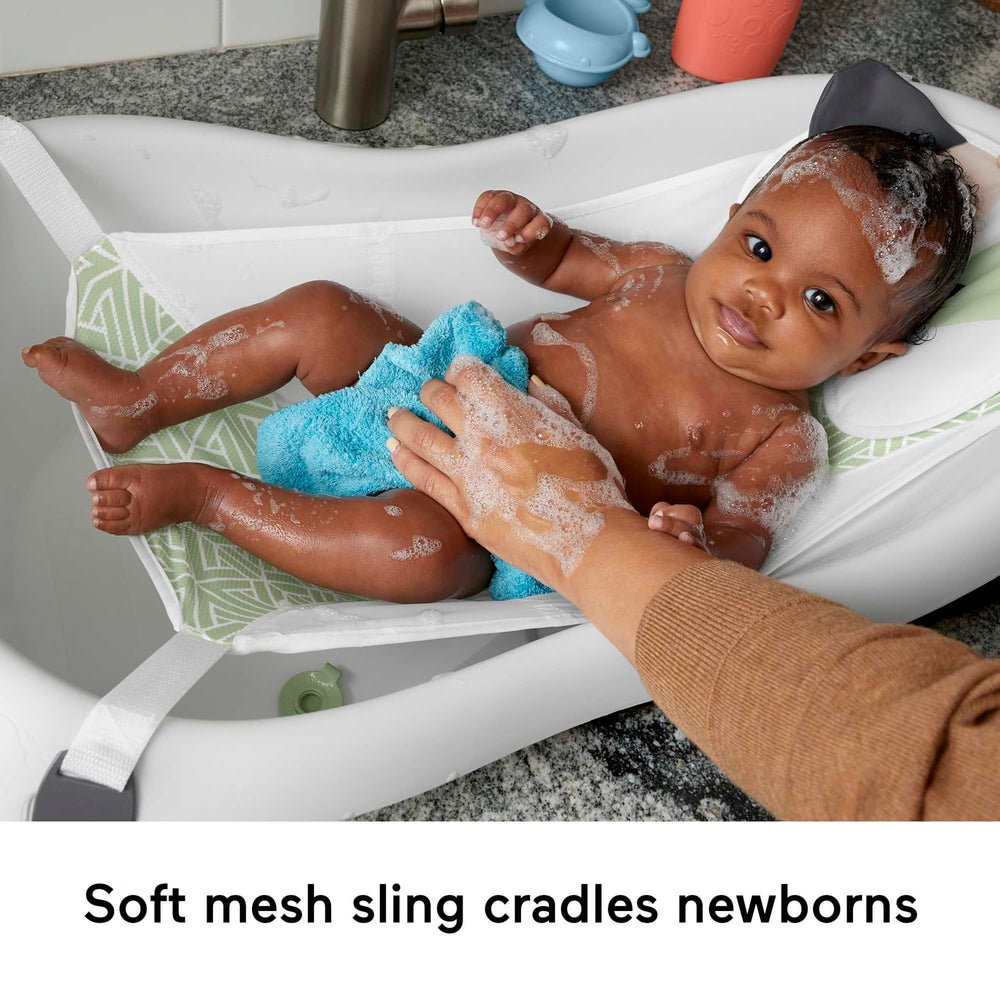 Fisher-Price toddler tub with rinse scoop offers room to splash.