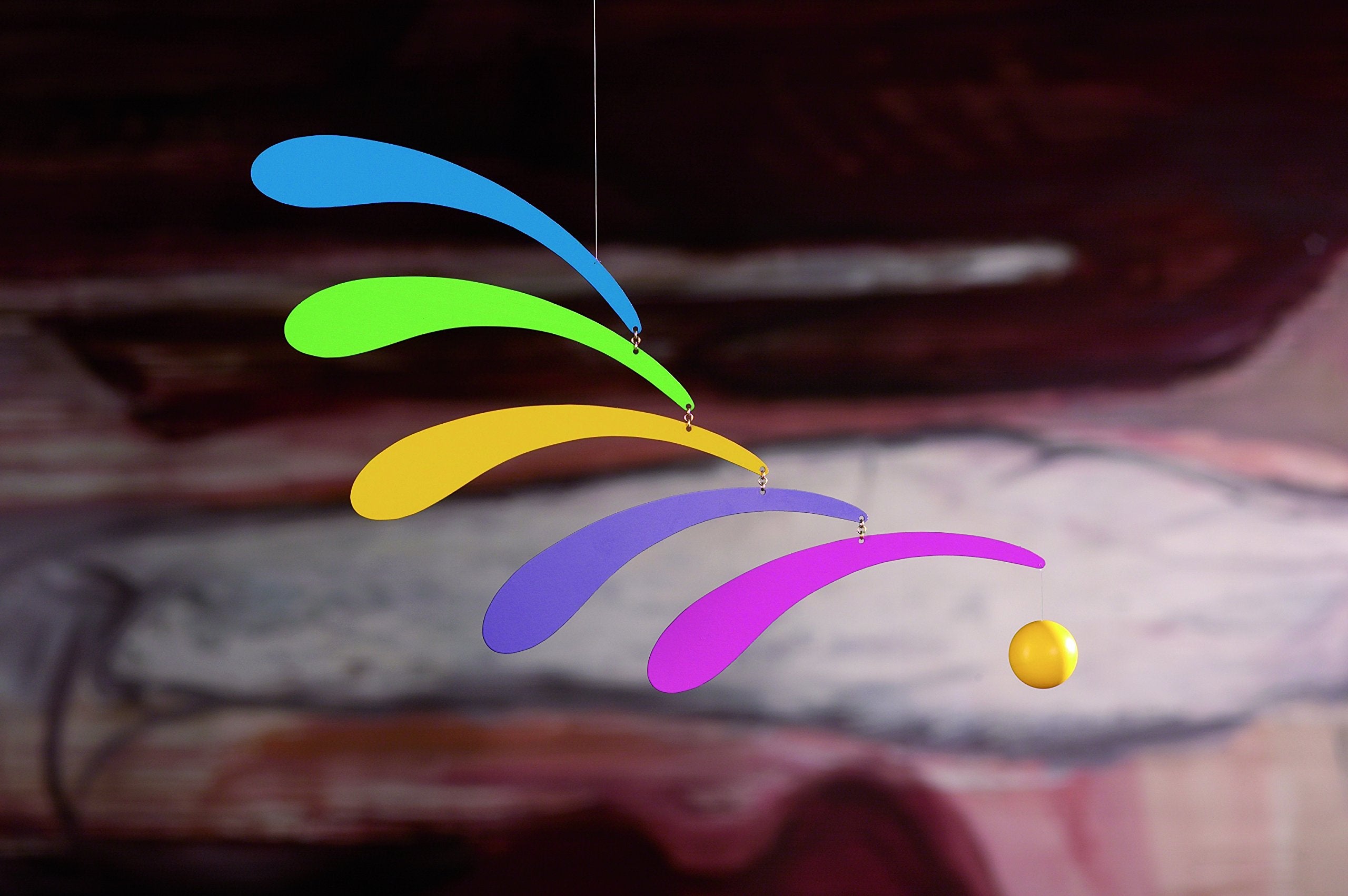 Flensted Flowing Rhythm Rainbow Mobile in motion produces gentle wall shadows.