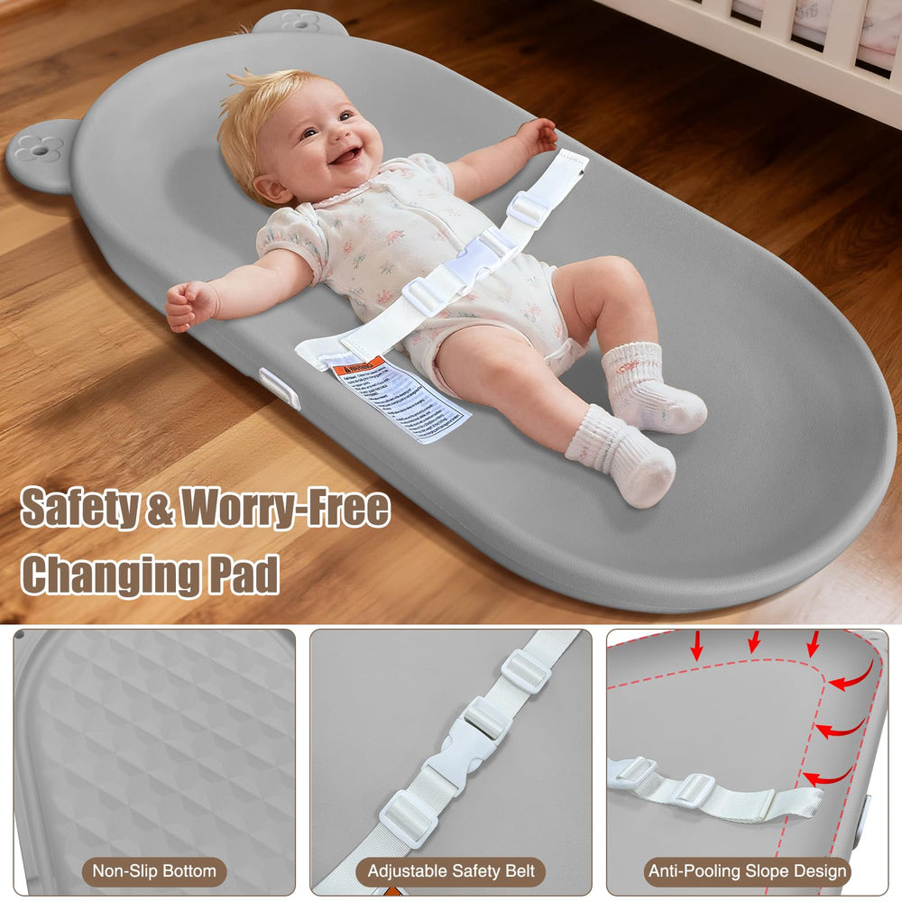 FLEUFAB changing pad with non-slip bottom for stable diaper changes.