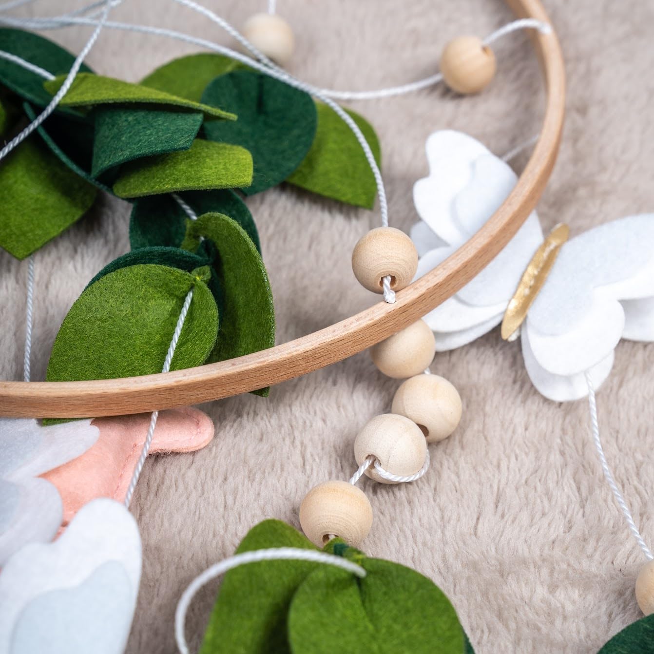 Flora & Ivy butterfly mobile gift-ready packaging enhances baby shower presentation.