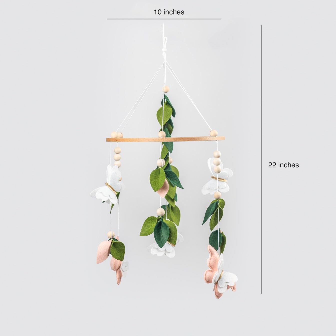 Flora & Ivy butterfly mobile green leaves add natural whimsy to a nature-themed nursery.