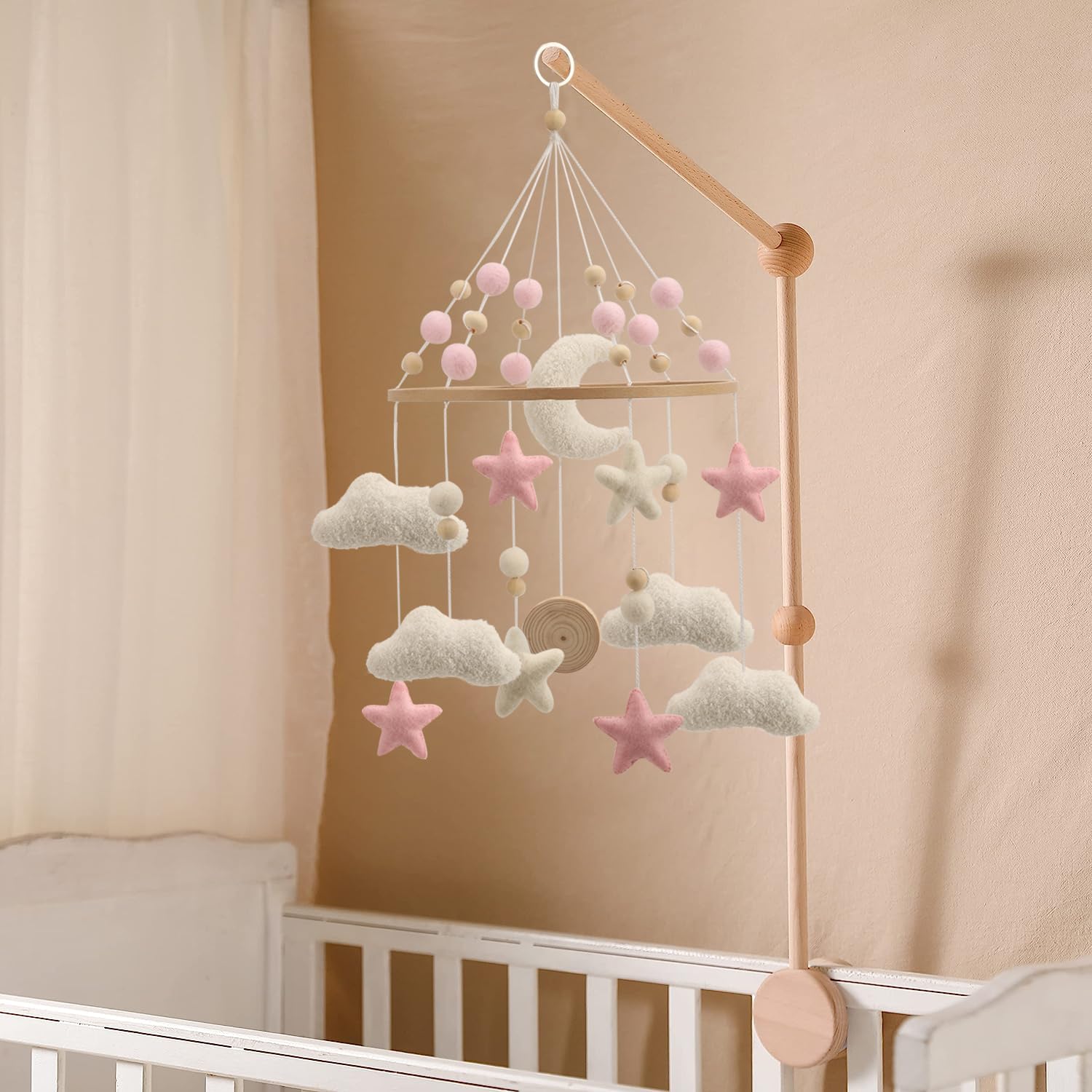 Flora & Ivy Cloud Mobile for Crib - clouds design supports calming bedtime visuals for baby.