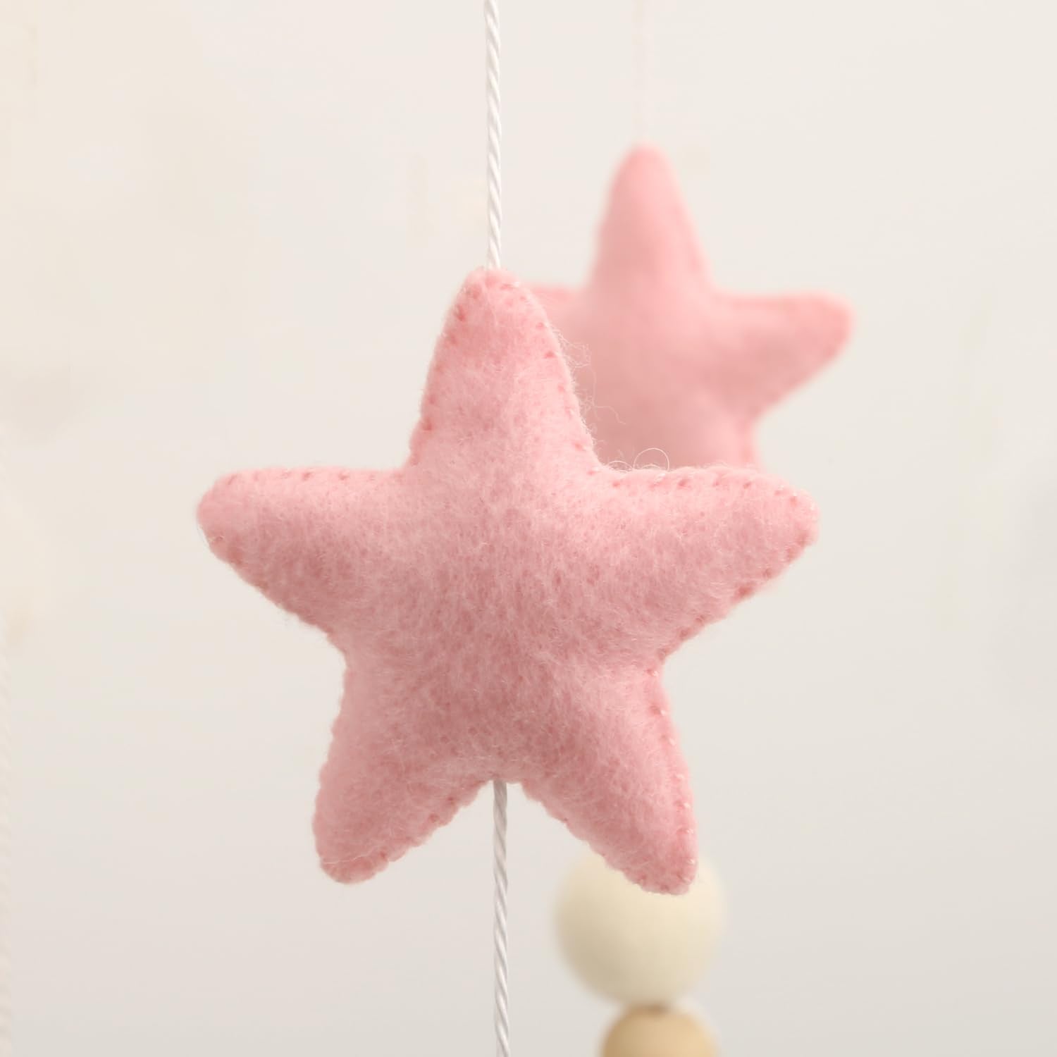 Flora & Ivy Cloud Mobile for Crib - handmade stitching adds artisanal charm and durability.